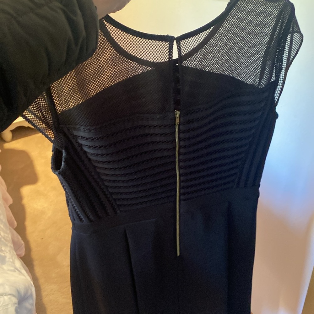 Gabby Skye navy dress size 8 nice material  has a stain on armpit but not seen